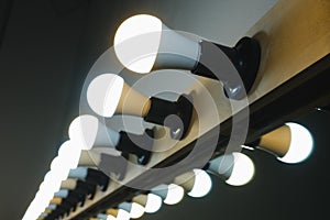 Bright lamps in a row on the make-up mirror for makeup artists and actors