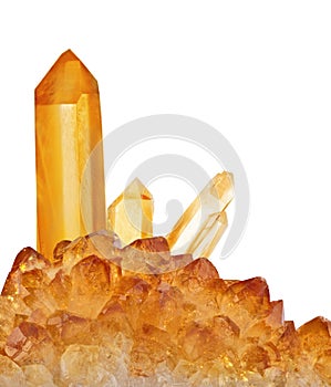 Bright large citrine crystals isolated on white photo