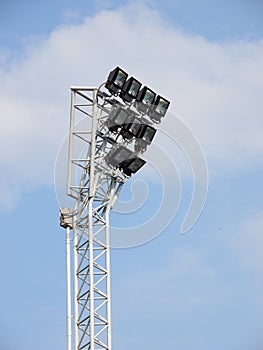 Bright large tall outdoor stadium spotlights