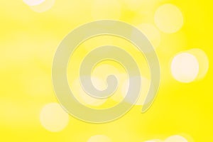 Bright light abstract yellow color bokeh background