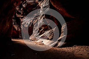 Bright Light Appears to Rush Around Dark Corner of Buckskin Gulch