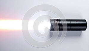 Bright Light Beam from a Tactical Black Flashlight