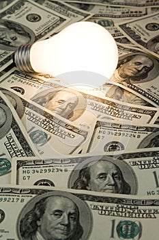 Bright Light Bulb and Dollar