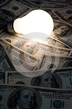 Bright Light Bulb and Dollar