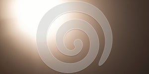 Bright light illuminating a soft surface in a dimly lit environment indoors