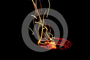 Bright light trail from fire