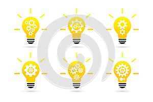 Bright lightbulb with gear wheels concept