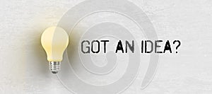 Bright lightbulb with message GOT AN IDEA? - 3d illustration