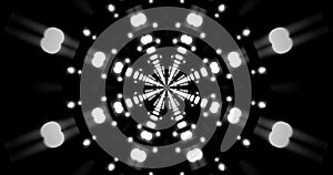 Bright lights create a tunnel effect in a dynamic black background