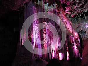 Lit-up draperies in Meramec Caves, Stanton, Missouri photo