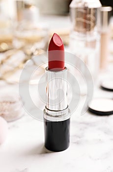 Bright lipstick on dressing table