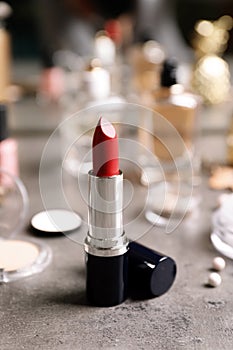 Bright lipstick on dressing table