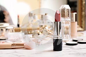 Bright lipstick on dressing table.
