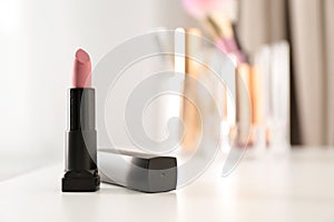 Bright lipstick on dressing table