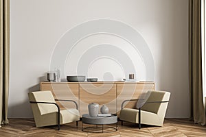 Bright living room interior with two comfortable armchair