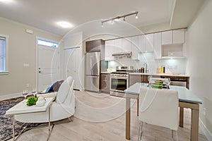 Bright living room with kitchen and a dinner table