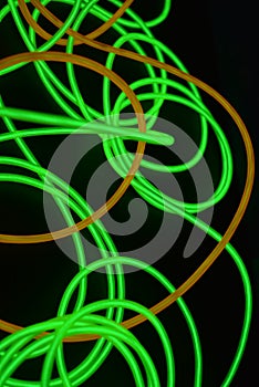 Bright luminous yellow and green, lime neon wires in different formats and layouts.