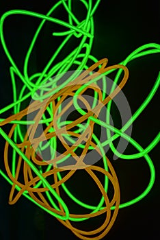 Bright luminous yellow and green, lime neon wires in different formats and layouts.