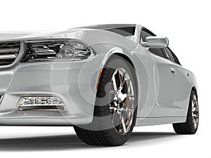 Bright metallic silver modern fast car - front view closeup cut shot