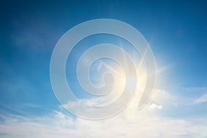 Sun and clouds in blue skies