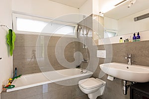 Bright modern bathroom with tiles