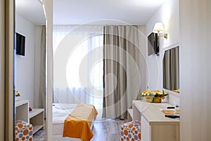 Bright and modern interior of hotel double room 2