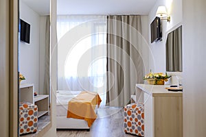 Bright and modern interior of hotel double room 3