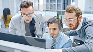 In Bright Modern Office: Businessman Sitting and Working at His Desktop Computer, Project Manager