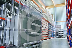 Bright modern Warehouse Storage with Workers commissioning in motion Bluer