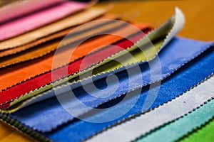 Bright multicolored fabric samples.