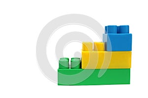 Bright multicolored toy constructor on white isolated background for entertaining children