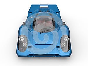 Bright navy blue vintage race super car - top front view