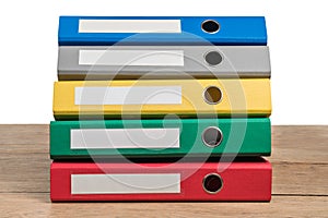 Bright office folders on wooden table