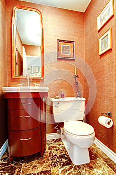 Bright orange bathroom in luxury house