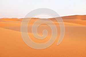 Bright orange sand dunes on the desert of Riyadh in Saudi Arabia