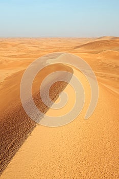 Bright orange sand dunes on the desert of Riyadh in Saudi Arabia