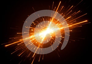 Bright Orange Sparkler Burst Against Black Background