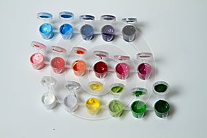 Bright paints for drawing in plastic jar