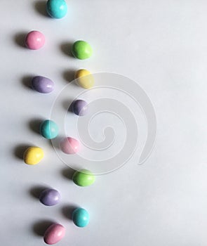 Bright pastel Easter candy on clean white background