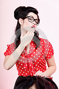 Bright picture of surprised woman face over pink