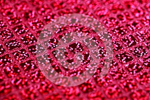 Bright pink fuchsia glitter squares sequin fabric background