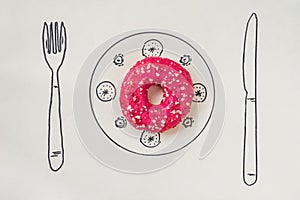 Bright pink glazed donut in drawn plate with cutlery, flat lay, food concept
