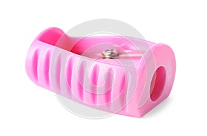 Bright pink pencil sharpener isolated on white. School stationery