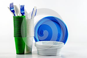 The bright plastic disposable tableware