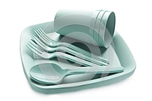 Bright plastic disposable tableware isolated on white background. Top view