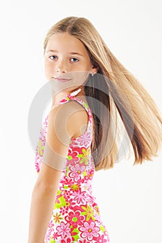 Bright portrait of blond small girl on white