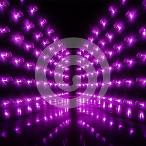 Bright purple LED wall lamps illuminate the background with incandescence photo