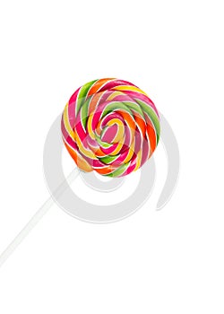 Bright rainbow round lollipop. Isolated on white background