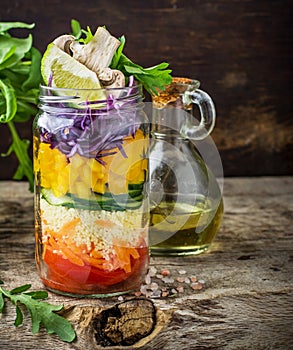 Bright rainbow salad of tomatoes, carrots, pepper