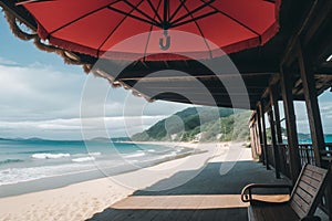 Bright rainbow umbrella on a sunny beach